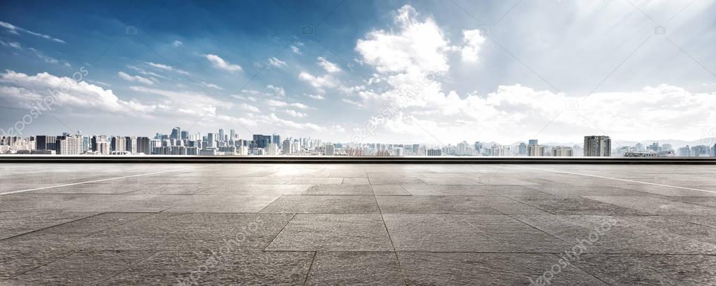 empty floor with cityscape of Hangzhou in cloud sky