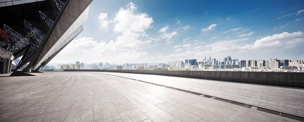 empty floor with cityscape of Hangzhou in cloud sky