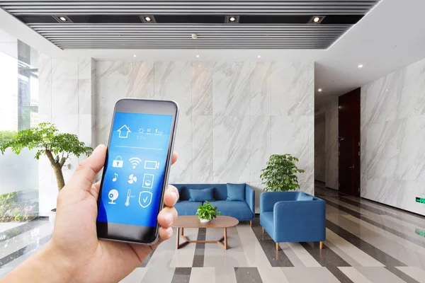 Smartphone in modern hallway — Stock Photo, Image