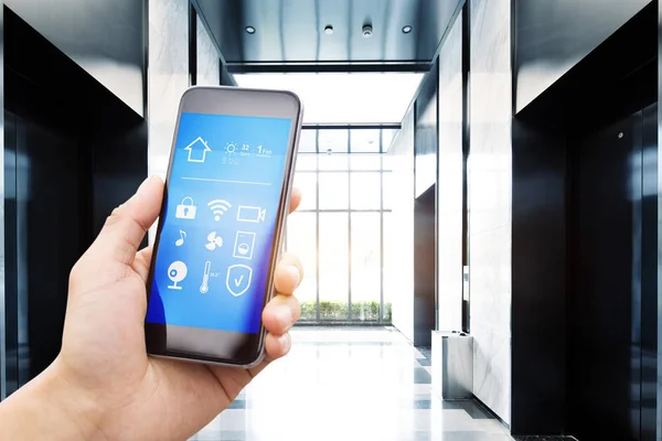 Smart phone in modern hallway — Stock Photo, Image