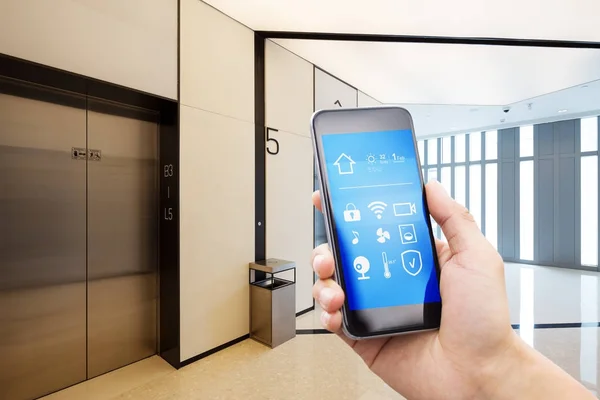 Smart phone in modern hallway — Stock Photo, Image