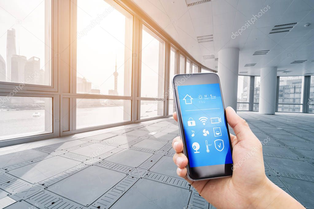 smartphone with smart home and modern office under sunbeam