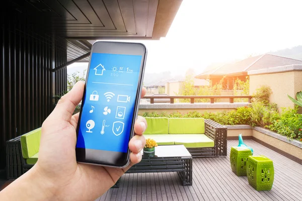 smartphone with smart home and modern balcony