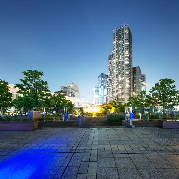 Modern buildings in modern city at night — Stock Photo, Image