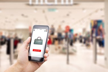 modern moda mağazasında online alışveriş ile cep telefonu