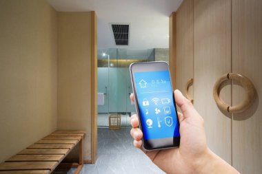 smartphone akıllı ev ve modern oda otel