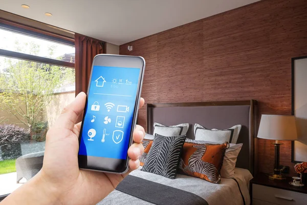 smartphone with smart home and modern bedroom