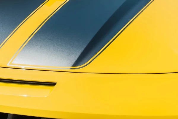 Close up of hood of a yellow sport car — Stock Photo, Image