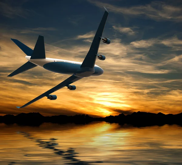 Airplane flying over water in the sunset — Stock Photo, Image