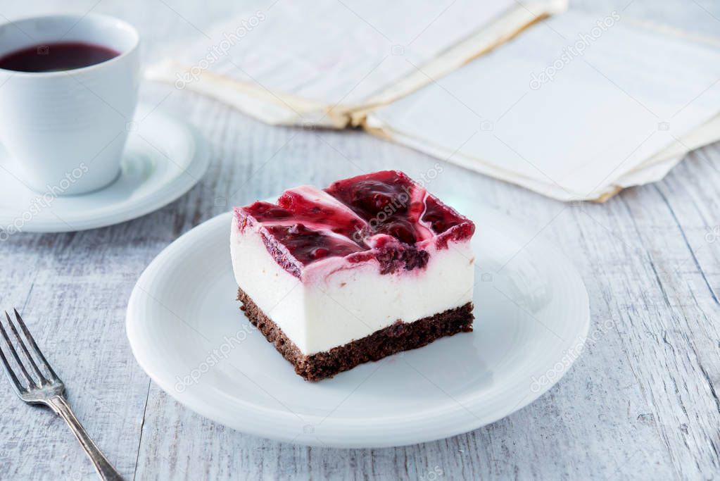 Delicious and sweet cheesecake with cherry jelly