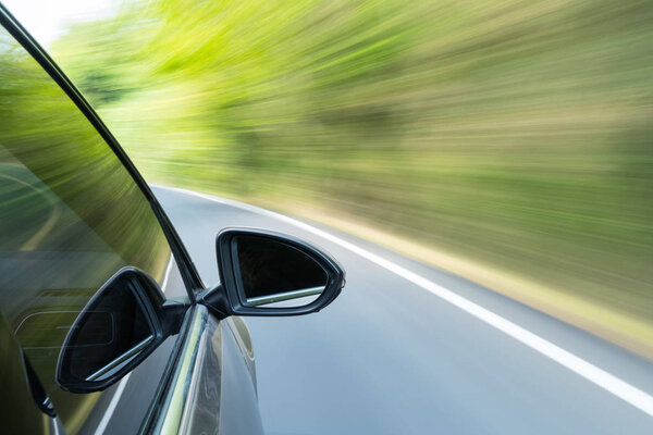 car driving with green motion blur