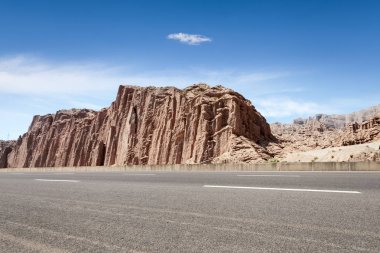 empty asphalt road with xinjiang geological landscape clipart
