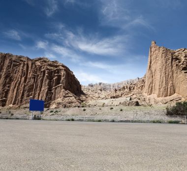 empty asphalt road with xinjiang geological landscape clipart