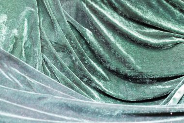 yeşil kadife kumaş arka plan, soyut kıvrımlı doku