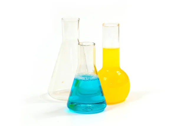 Glass Flasks Multicolored Chemicals Stand White Laboratory Table — 图库照片