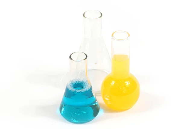 Glass Flasks Multicolored Chemicals Stand White Laboratory Table — 图库照片