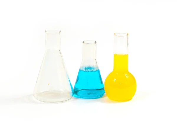 Glass Flasks Multicolored Chemicals Stand White Laboratory Table — 图库照片