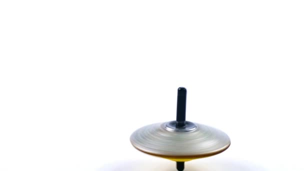 Spielzeug Yula Kreisel Dreht Sich Auf Der Oberfläche Des Tisches — Stockvideo