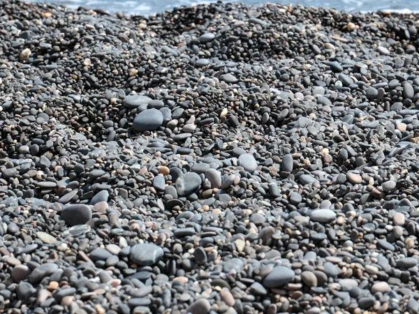 Arrotondato Pietra Ghiaia Acqua Mare Sulla Spiaggia — Foto Stock