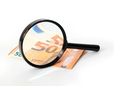 checking paper notes of the European Union Euro with a magnifying glass