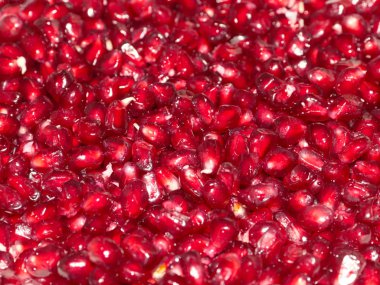 beautiful bright ripe grains of tropical pomegranate fruit