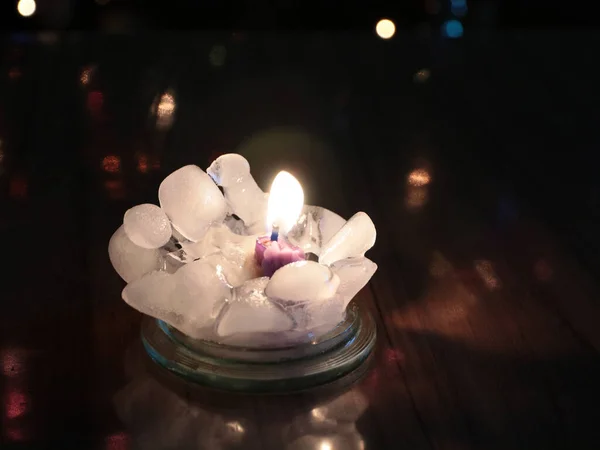 Bright Fire Wax Candle Surrounded Transparent Clear Chunks Ice — 스톡 사진