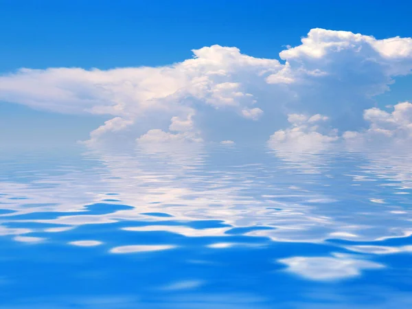 reflection of the cloudy sky in the calm water surface of the sea