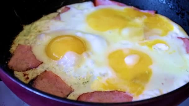 Process Cooking Fried Eggs Chunks Juicy Sausage — Stock Video