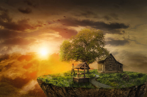 Lonely girl on the flying island looks at bright sunset next to the house of his childhood