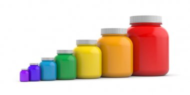 Beyaz kapakları ile renkli kavanoz 