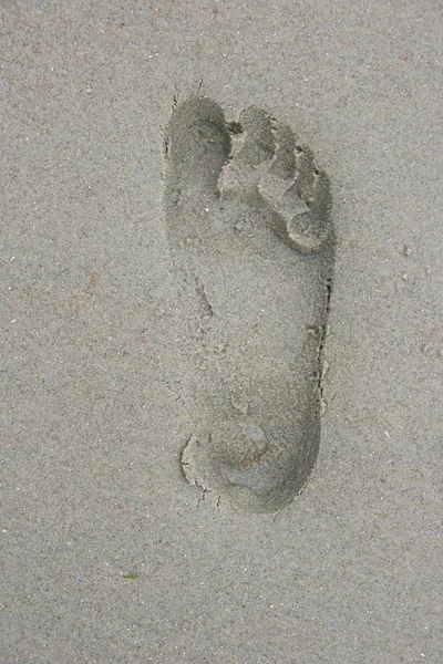 Uma Pegada Humana Areia — Fotografia de Stock