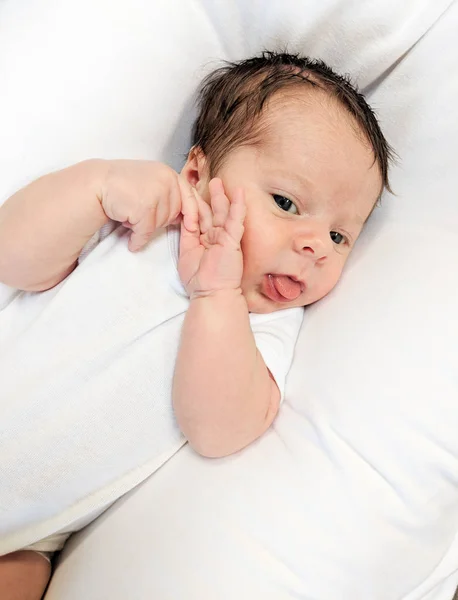 Niño Descansando Blanco Con Lengua Sobresaliendo Imagen De Stock