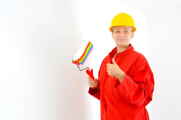 Real female painter renovating her apartment — Stock Photo, Image