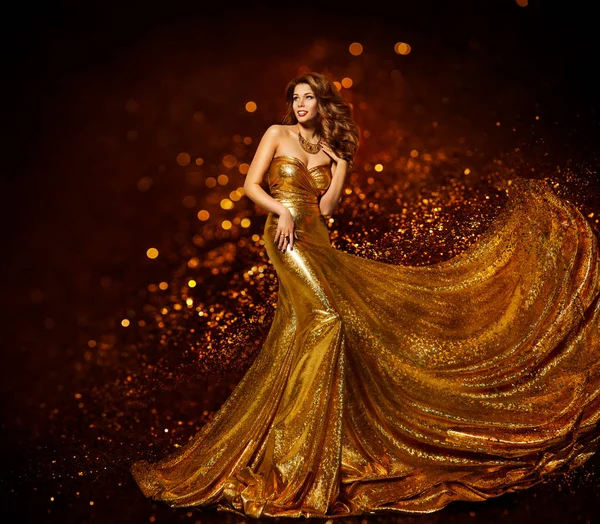 Kobieta moda złota suknia, luksusowe dziewczyna w złotej tkaniny suknia — Zdjęcie stockowe