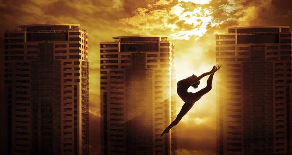 High Rise Building and Sport Woman Dancing Jump, Dancer Silhouette — Stock Photo, Image