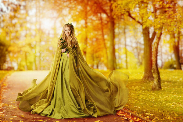 Autumn Woman, Fashion Model Outdoor Portrait, Girl in Autumnal Dress walking in Yellow Fall Leaves Park