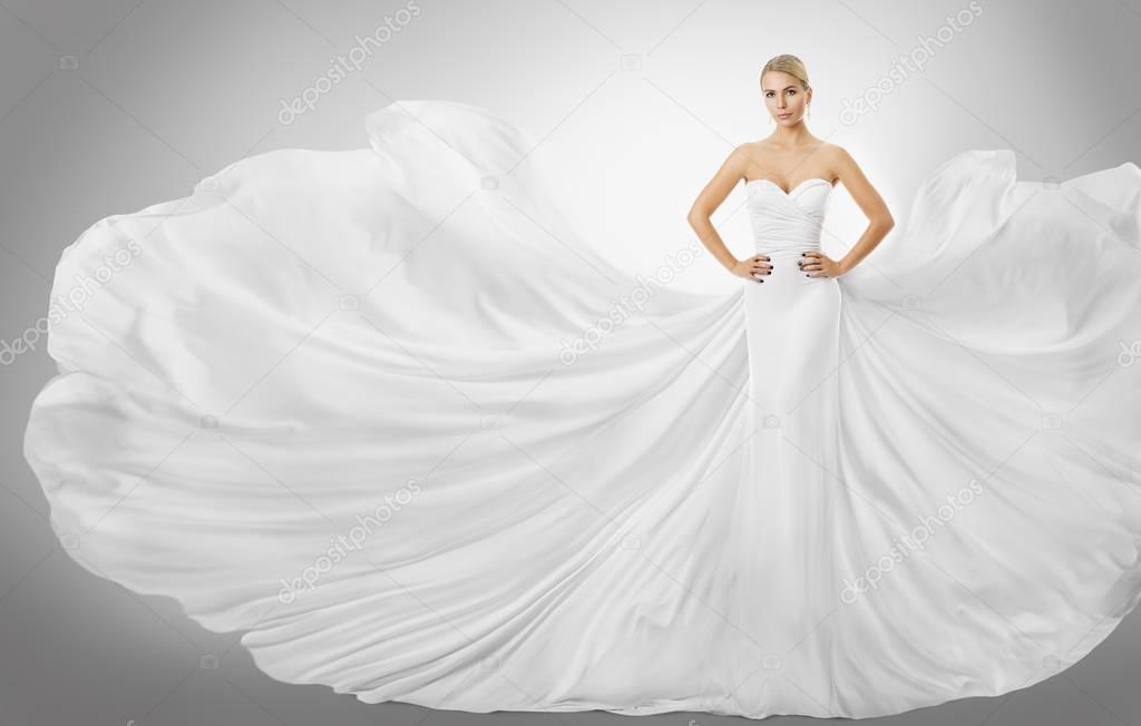 Woman White Flying Dress, Elegant Fashion Model in Wedding Fluttering Gown, Bride Beauty Portrait