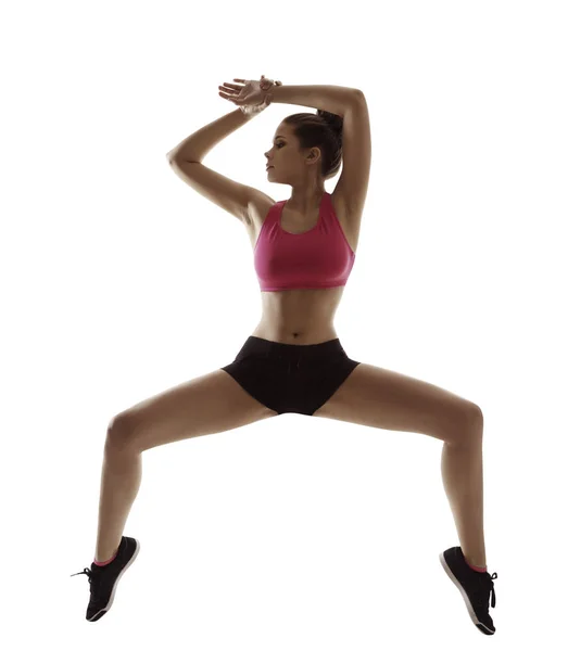 Fitness cvičení nohy od sebe, Žena sportovní cvičení gymnastiky trénink, bílá, samostatný — Stock fotografie
