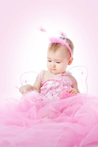 Holčička v růžových šatech, dítě krásy portrét, dítě v pohádkové kostýmy — Stock fotografie