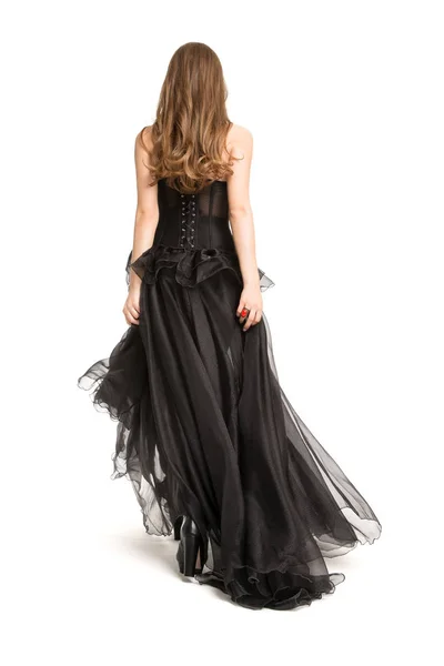 Mujer espalda Vista trasera en vestido negro, Hermosa modelo de moda — Foto de Stock