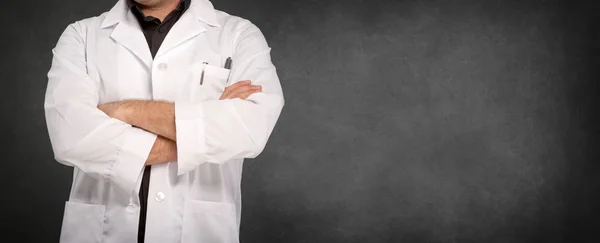 Man in lab coat and blackboard — 스톡 사진