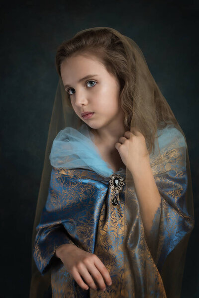 Portrait of a girl in a costume of the last century