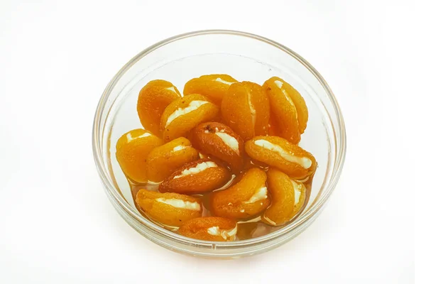 Isolated dried apricots with cheese on white background with clipping path