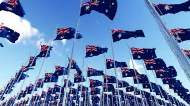 Avustralya mavi gökyüzü karşı rüzgarda sallayarak birçok bayrakları. 