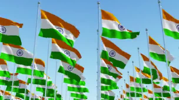 Flags of India waving against clear blue sky. — Stock Video