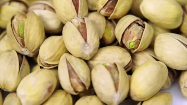 Green fresh pistachios as texture. — Stock Video