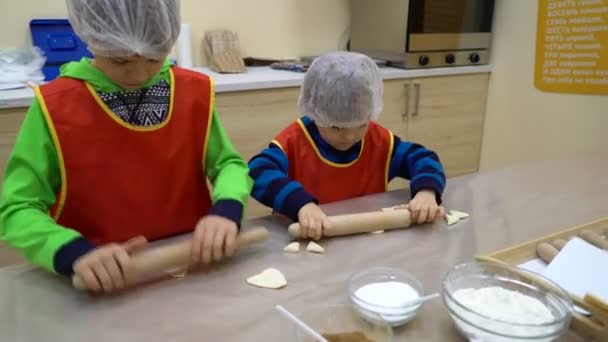 Two Kids Rolling Dough Prepering Cookies Kitchen — Stock Video
