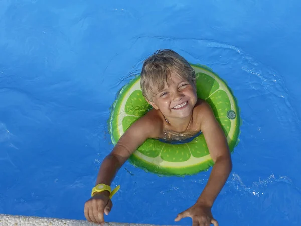 Happy Little Boy Playing Colorful Inflatable Ring Outdoor Swimming Pool Royalty Free Stock Photos