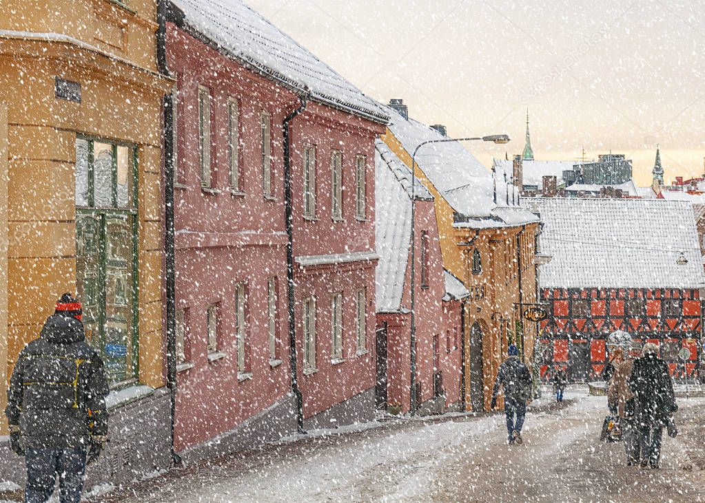 The streets of Helsingborgs old town in Sweden during a snowstorm.