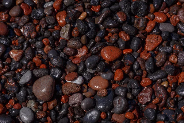 Kamienie na plaży Red — Zdjęcie stockowe